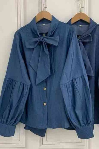 BLUSA EFECTO DENIM CON LAZO Y MANGA ABULLONADA TB1D2332